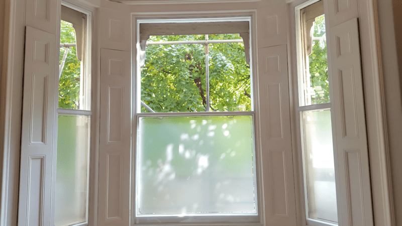 Hinged acoustic secondary glazing with full access opening for period homes